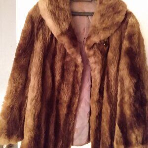 Manteau véritable fourrure , excellent état taille Mcouleur Marron